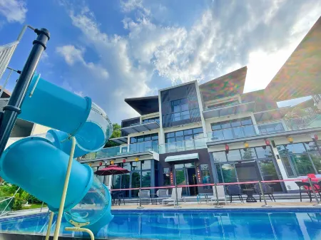 Leisure Hot Spring Residence Housing Отели рядом с достопримечательностью «Xincun Gymnasium»