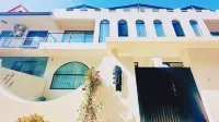 Quexishan Homestay 하이빈/해빈 공원-열대식물원 호텔