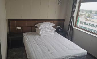 Wafangdian Xinyue Business Hotel