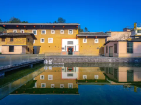 Yongding Earth Building Duilu · Shengheng Building World Heritage Home Stay Hoteles en Longyan