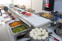 Junchang Hotel - servizio colazione