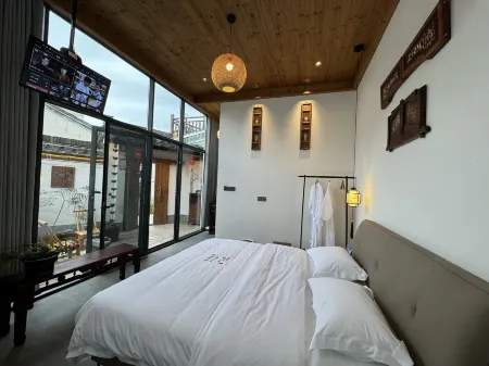 GreenWildCourtyard Отели рядом с достопримечательностью «Fenglehu Scenic Area»