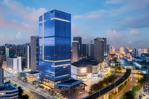 Youshan Suyu Holiday Hotel (Haikou High-Speed Railway East Station Longhu Tianjie)