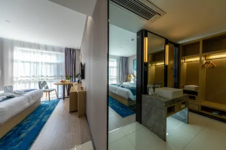 Echarm Hotel Отели рядом с достопримечательностью «Dabie Mountain Azalea Ecological Cultural Grand View Garden»