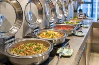 Manju Hotel (Zhuji Wanfeng Xintiandi Yongli Plaza) - servizio colazione