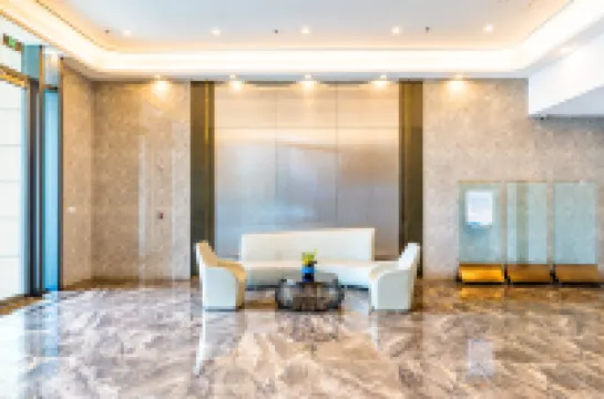 Tuyuan Seaview LOFT Holiday Apartment (Weihai Ferry Terminal Huafa Xintiandi Branch)