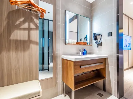 HanTing Hotel (Tianjin Dagang Yingbin Street) Отели рядом с достопримечательностью «Tianjin Prosecutors College»