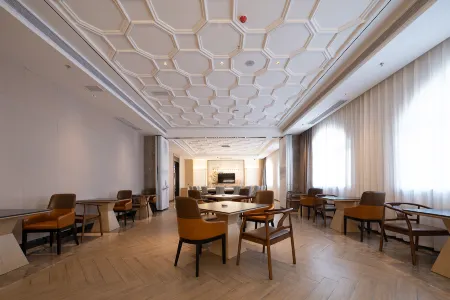 Vienna International Hotel (Nanfeng Judu Avenue) Отели рядом с достопримечательностью «Wanfu Ancient Temple»