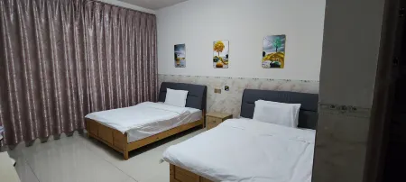 Manzhu Hotel Отели рядом с достопримечательностью «Lufeng Dinosaur Fossil Site»