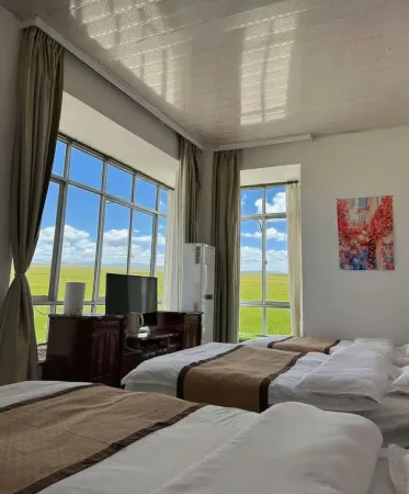 Dangxiong Jianglong Hotel (Namcuo Scenic Area) Отели рядом с достопримечательностью «Народный конгресс Наму»