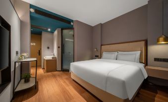 Ginza Jiayue Select Hotel (Qihe Wanda Plaza Spring City Oulebao)