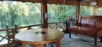 Hechi Menggu Inn - Homestays
