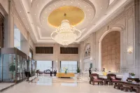 Vienna International Hotel (Zhangshu Times Square Renhe) Hôtels à : Zhangshu