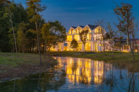 Floral Hotel· Shanghai Jiuxiang hotel (Chongming Forest Park store) Отели рядом с достопримечательностью «Chongming Xunyicao Theme Park»