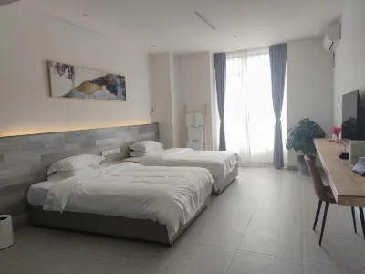 hefeng yubai hotel Отели рядом с достопримечательностью «Академия Общественной Авиалогии В Новом районе Тяньфуа»