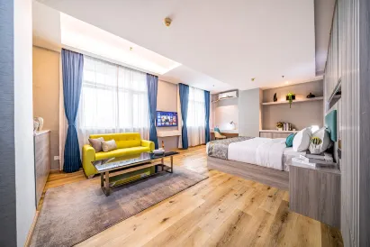Meisong Xige Business Hotel (Shenzhen International Convention and Exhibition Center)