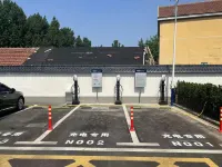 Magnotel Hotel (Linyi Mengyin Yunmeng Road) - parking