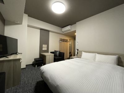 スタンダードダブル禁煙 ホテルルートイン見附 -中之島見附インター-の写真