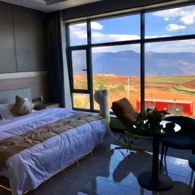 hong tu di  zhang jia da yuan  homestay Hotels near Dongchuan Red Land