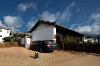 Yulong Mujianshan Homestay - parcheggio