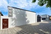 新源軒培居|Warm Lodge·庭院休閒民宿（新源客運站店）