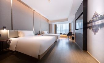 elegant, contemporary bedroom featuring double beds and expansive windows at ATOUR HOTEL,Happy Avenue, Shunde OCT Harbour Branch, Foshan