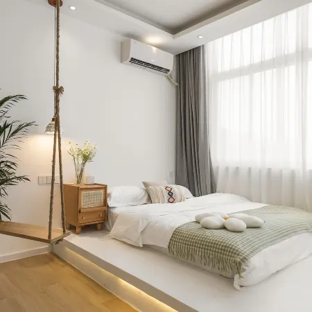 Qianxun Designer Homestay (Dengzhou Guangyi Sleepless City Branch)