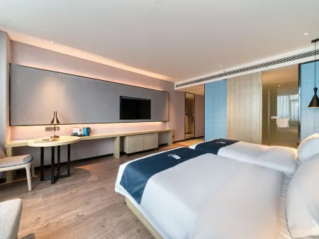 Echarm Hotel (Nanjing Olympic Sports Center Hongyang Home Expo Center Subway Station) Отели рядом с достопримечательностью «Nanjing Qing'ao Center»