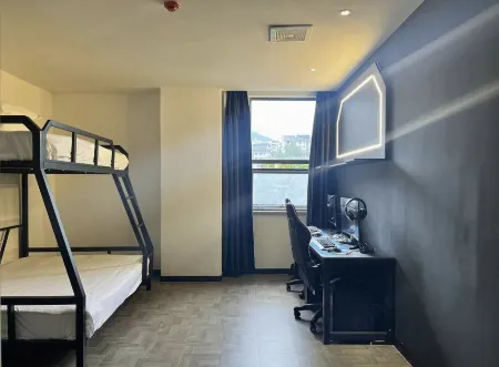 Qianqian E-sports Hotel Отели в г. Санцжи