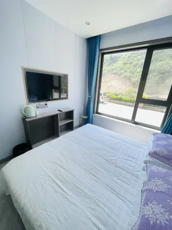 Huguan Jiujiayi Farm Inn Отели рядом с достопримечательностью «Jiulongdong Sceneic Area»