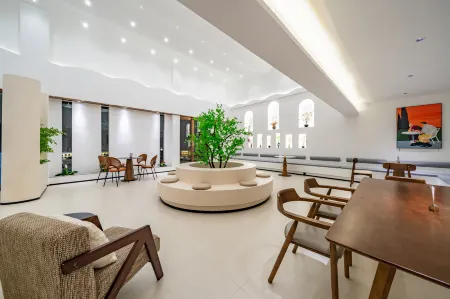 Haiyang Holiday Hotel (Jiangzhou Peninsula Tourist Resort, Huan Island Tourist Road Store) Отели рядом с достопримечательностью «Xinglong Tropical Garden»