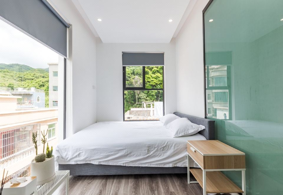 Shen zhen yang mei keng lin lan hai jing min su - Housity