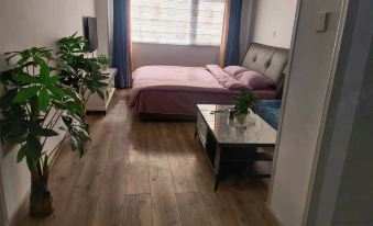 Aizhilian Homestay (Linyi Vientiane Sunshine City Shop)