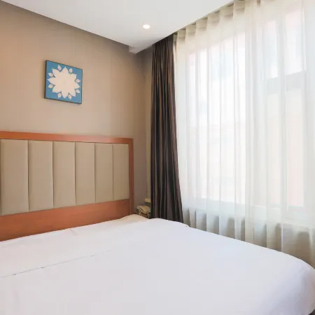 May Flower Hotel (Yanji Yanbian University Floating Market Branch)