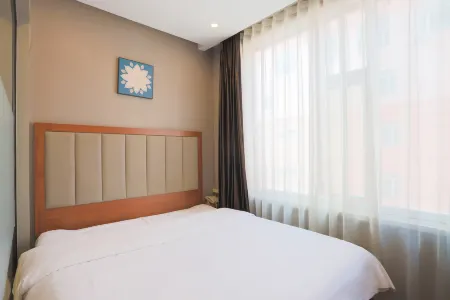 May Flower Hotel (Yanji Yanbian University Floating Market Branch)