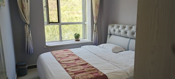 Haidong Ping'an District Youyou Homestay (Airport Branch) Hotele w: Haidong