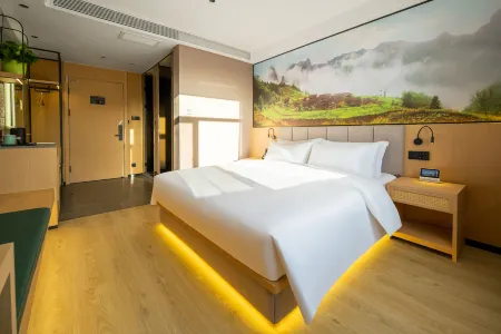 Yueju Business Hotel Отели в г. Хами