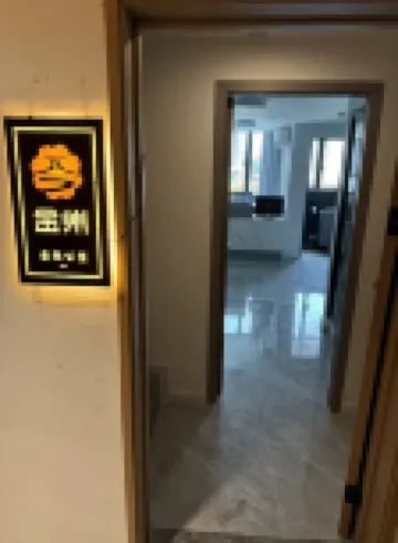 Jinzhou International Apartment Hotels near Jiaomen Park