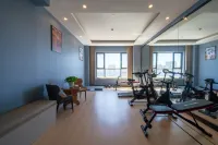 柏納飯店（新源客運站人民廣場店）