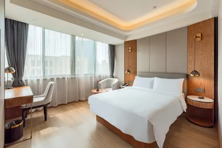 Yitel Collection (Jiaxing Nanhu Wanda Plaza) Отели рядом с достопримечательностью «Jiaxing Botanical Garden»