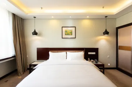 Jincheng Hotel (Xinyang North Overpass) Отели рядом с достопримечательностью «Xinyang Normal University»