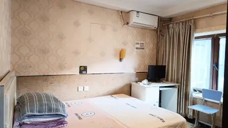 Shengliang Hotel Отели рядом с достопримечательностью «Ironman Square»