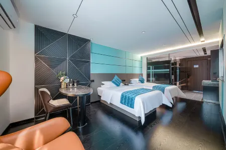 Doman Qingyue Hotel (Nanning East Railway Station Oriental Plaza) Отели рядом с достопримечательностью «Guangxi University of Foreign Languages»