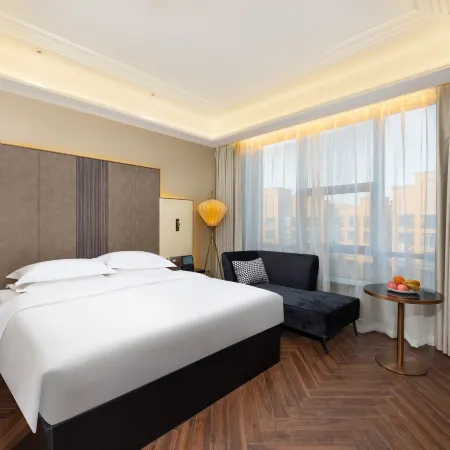 Jinjiang Metropolo Hotel (Xinyang Railway Station Xiya City)