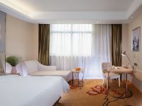维也纳国际酒店(凭祥市政广场店) - 豪华大床房