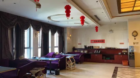 Xinyoulian Business Hotel Отели в г. Юнань