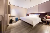 โรงแรมอีชาร์ม พลัส (สาขา เมืองมิตรภาพแสงแดด ไหโข่ว สวนเอเวอร์กรีน) - 4 ดาว