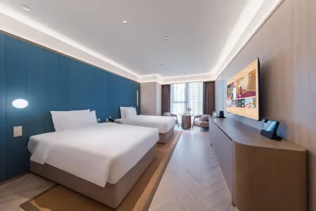 Crystal Orange Hotel (Shenzhen Nanshan Xinhaofang Branch) Отели рядом с достопримечательностью «Спортивный центр Боань-поле для плавания»