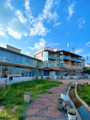 Kunming Caiyunxuan Themed Inn Hotel in zona Dongchuan Red Land