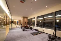 Bairan Private Hot Spring Smart Cinema Design Hotel (Xingyi Jushan Square Huijin Center)